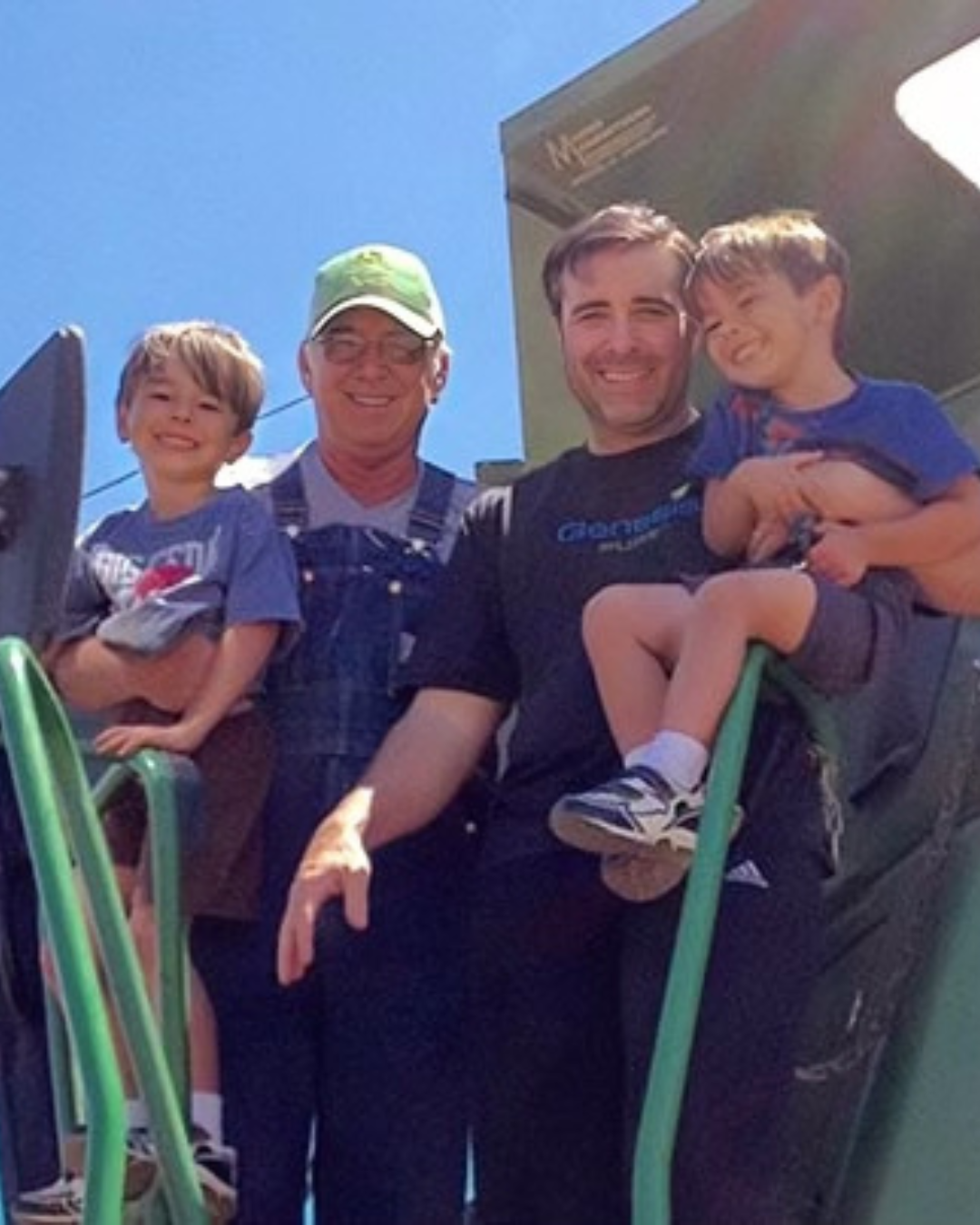 Photo of Motivational speaker and Life Coach Jeremy Fouts with his dad and sons at the Fouts Family Farm.